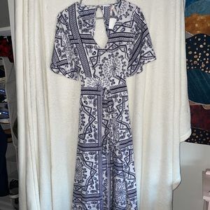 navy and white romper with shorts and long back